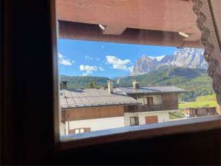 Enjoy breathtaking mountain views from this charming property.