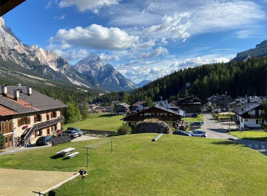 Experience breathtaking mountain views from this charming property.