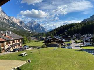Experience breathtaking mountain views from this charming property.