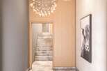 Step into a world of refined elegance with this stunning entryway.