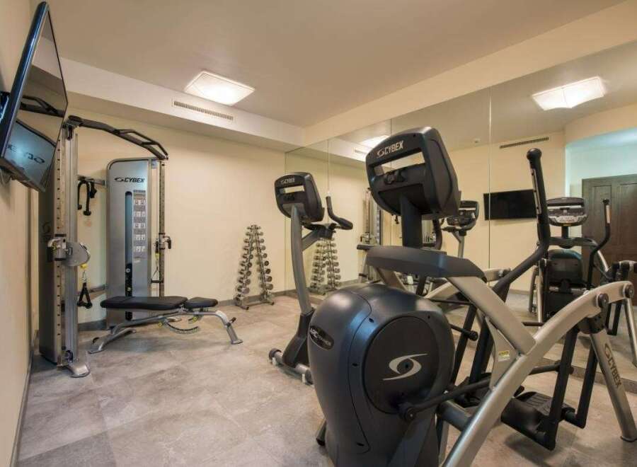 This well-equipped gym offers a variety of Cybex machines for a comprehensive workout.
