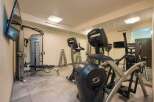This well-equipped gym offers a variety of Cybex machines for a comprehensive workout.