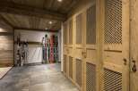 This stunning property boasts a ski storage room, perfect for winter enthusiasts.