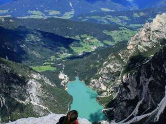 Explore breathtaking mountain views and a stunning turquoise lake.