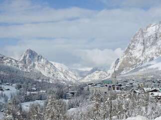 Experience the breathtaking beauty of a snow-covered mountain village.
