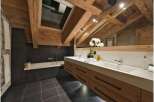 Experience rustic elegance in this stunning bathroom.