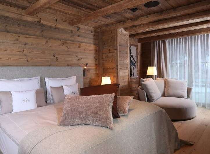 Experience rustic elegance in this cozy bedroom.