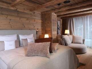 Experience rustic elegance in this cozy bedroom.