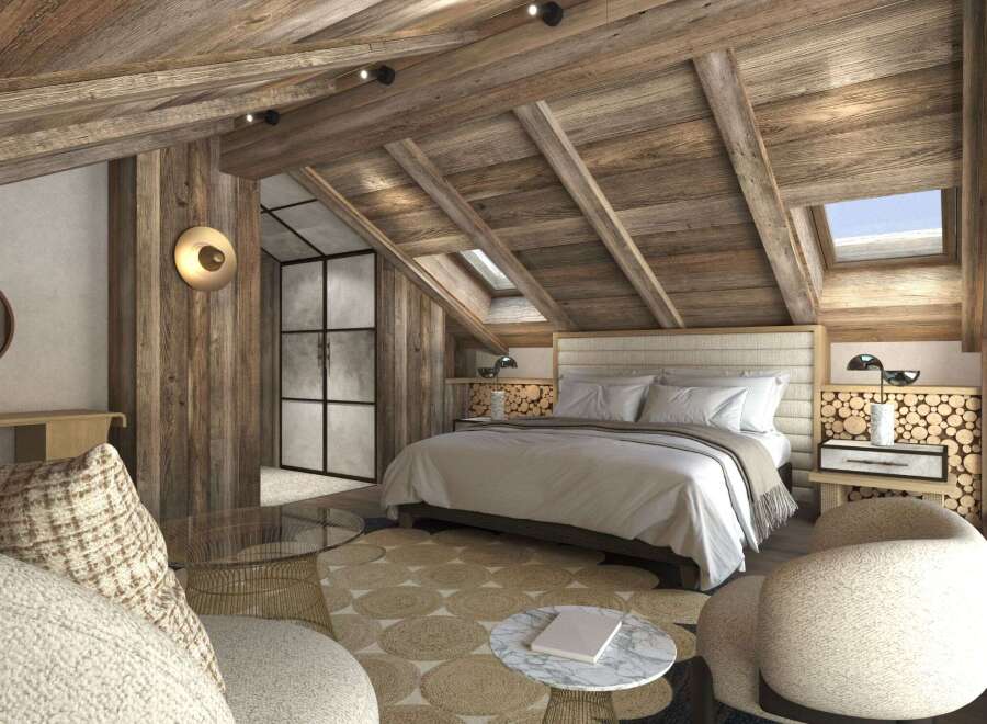Experience rustic luxury in this stunning bedroom, featuring a beautifully crafted wooden ceiling and walls.