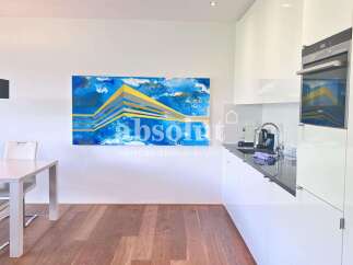 Discover modern living in this stunning property! Featuring a sleek, contemporary kitchen with high-end appliances and ample counter space.