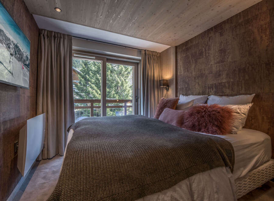Cozy bedroom with a stunning view.