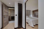 Step into luxury with this stunning property, showcasing exquisite wooden accents and a modern design.