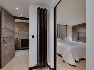 Step into luxury with this stunning property, showcasing exquisite wooden accents and a modern design.