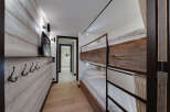 This charming ski chalet features a cozy bunk room perfect for families or groups.