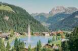 Discover the charm of this picturesque lakeside property, nestled amidst stunning mountain scenery.