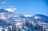 Experience the ultimate winter wonderland in this stunning mountain landscape.