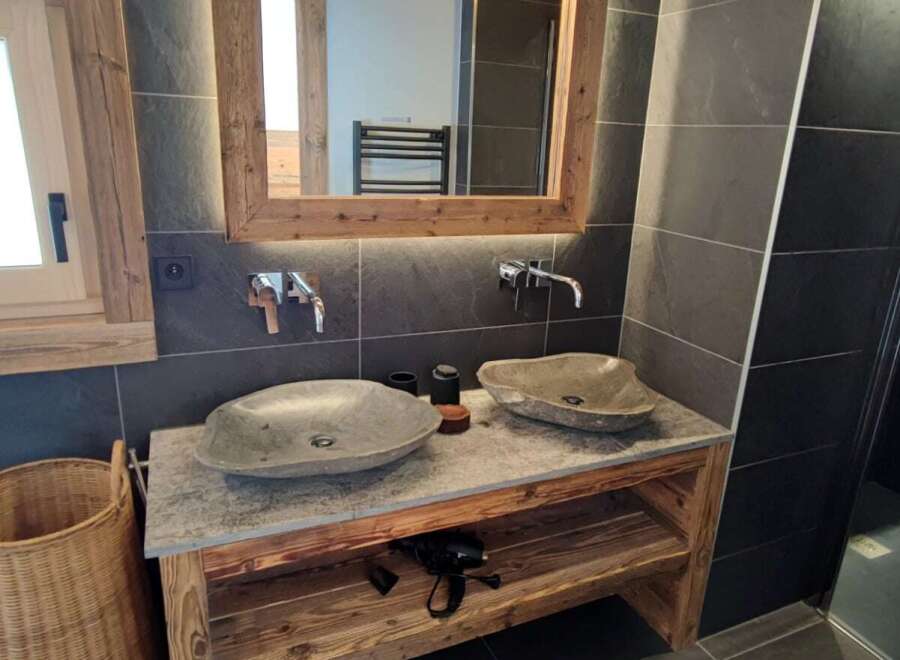 Experience rustic elegance in this stunning bathroom.