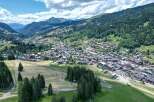 Discover the charm of this picturesque mountain village nestled amidst lush greenery and towering peaks.