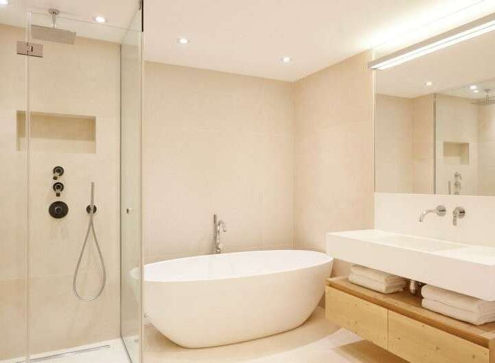 Discover a luxurious bathroom retreat featuring a sleek, modern design.