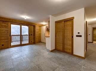 Step into this stunning property featuring a seamless blend of natural wood and modern design.