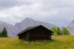 Nestled amidst breathtaking mountain scenery, this charming cabin offers a tranquil escape.