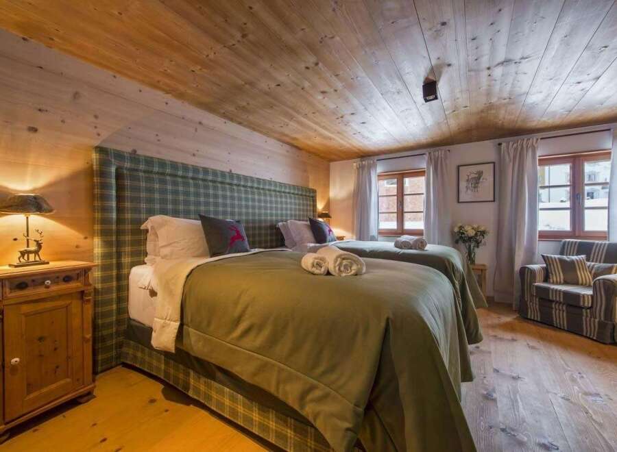Experience rustic charm in this cozy bedroom.