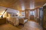 Experience rustic charm in this cozy bedroom.