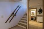 This charming property features a cozy interior with wooden accents and a welcoming atmosphere.