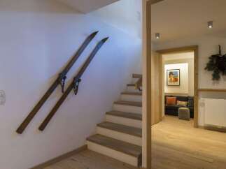 This charming property features a cozy interior with wooden accents and a welcoming atmosphere.