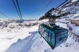 Experience breathtaking views of the Dolomites from the Porta Vescovo cable car.