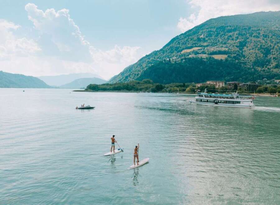 Enjoy a serene day on the water with stunning mountain views.