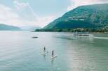 Enjoy a serene day on the water with stunning mountain views.
