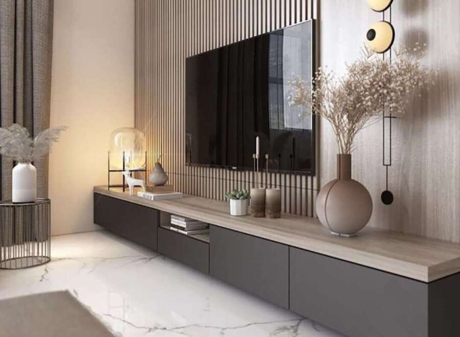 This modern living room features a sleek, floating TV console with ample storage.