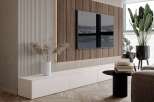 This stunning living room showcases a modern design with a focus on natural elements.