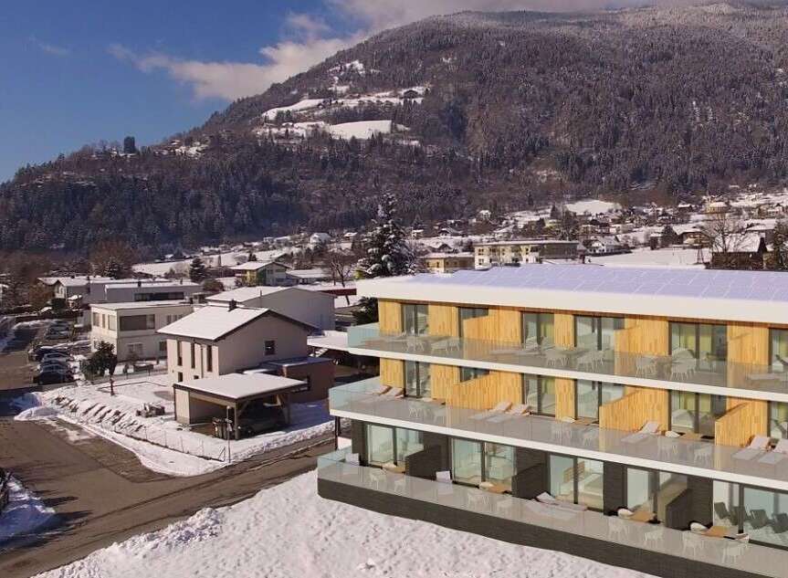 Discover a stunning modern property nestled in a picturesque mountain setting.
