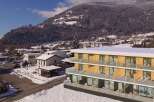 Discover a stunning modern property nestled in a picturesque mountain setting.