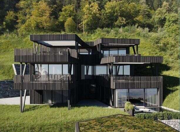This stunning modern home boasts a unique architectural design with multiple levels and expansive balconies.