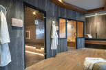Indulge in tranquility at our luxurious spa, featuring two pristine saunas encased in sleek glass doors.