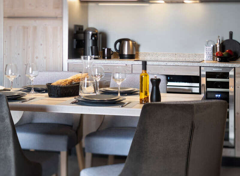 This stunning apartment boasts a fully equipped kitchen with modern appliances and ample counter space, perfect for preparing delicious meals.