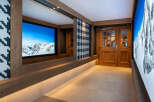 This stunning hallway boasts a built-in bench with integrated lighting, offering both style and functionality.
