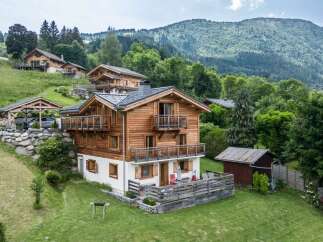 This stunning chalet boasts breathtaking mountain views and offers ample space for relaxation and entertainment.