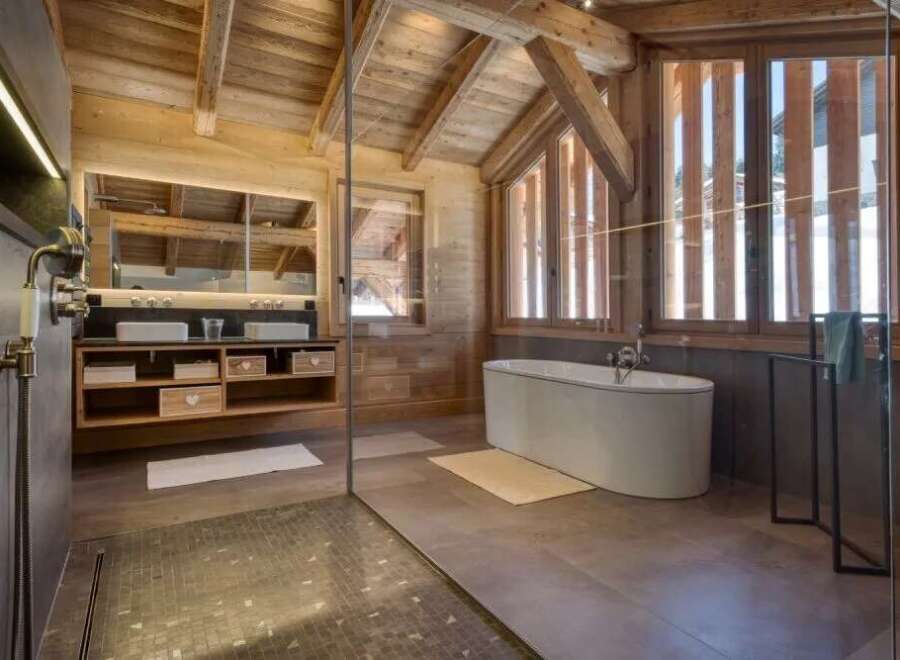 Experience rustic luxury in this stunning bathroom.