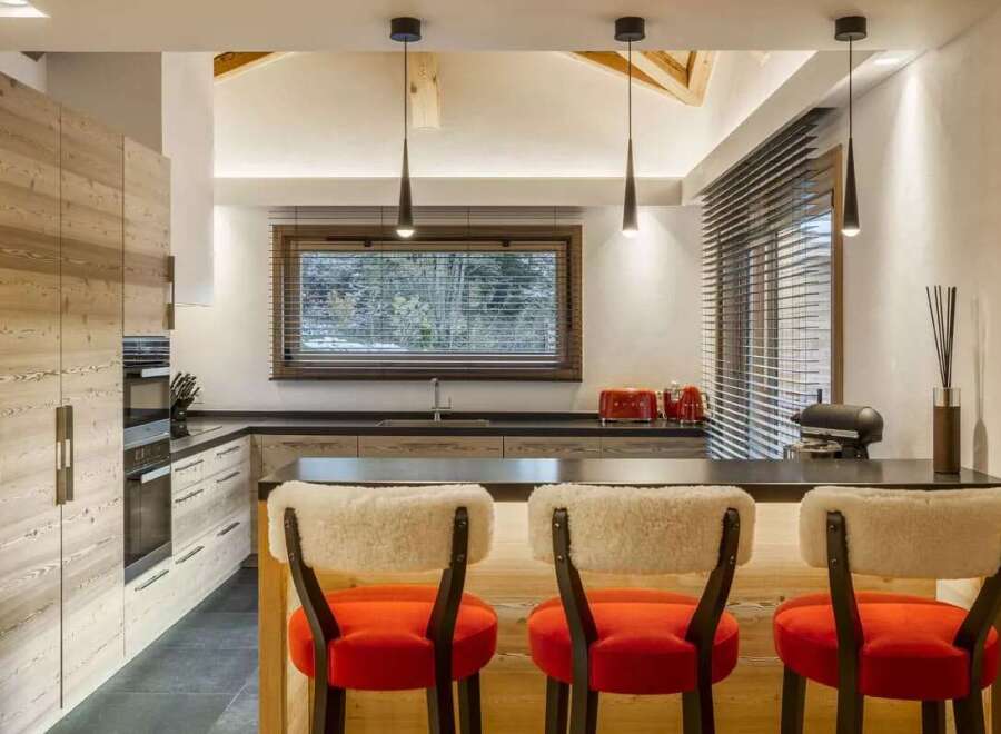This stunning kitchen boasts a modern design with a touch of rustic charm.