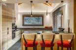 This stunning kitchen boasts a modern design with a touch of rustic charm.
