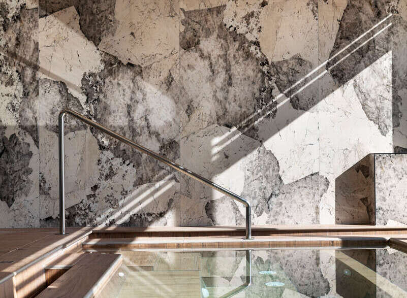 Indulge in tranquility at this luxurious spa, featuring a stunning indoor pool with a glass bottom offering a unique perspective.