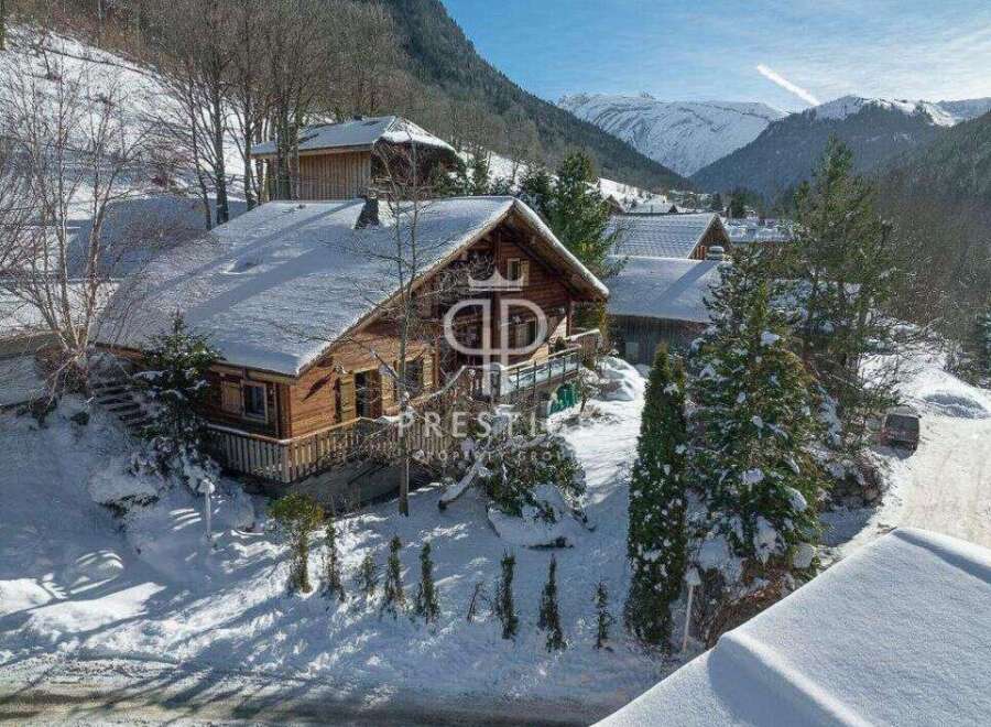 Discover a stunning chalet nestled in a picturesque winter wonderland.