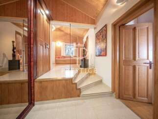 Step into luxury with this stunning property! Featuring a beautifully designed interior with wooden accents and a modern aesthetic.