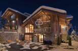 Experience luxury living in this stunning chalet, showcasing exquisite wooden architecture and a cozy ambiance.