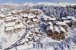 Discover the epitome of alpine luxury in this stunning chalet village nestled amidst snow-capped mountains.