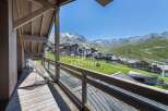 Enjoy breathtaking mountain views from this stunning balcony.